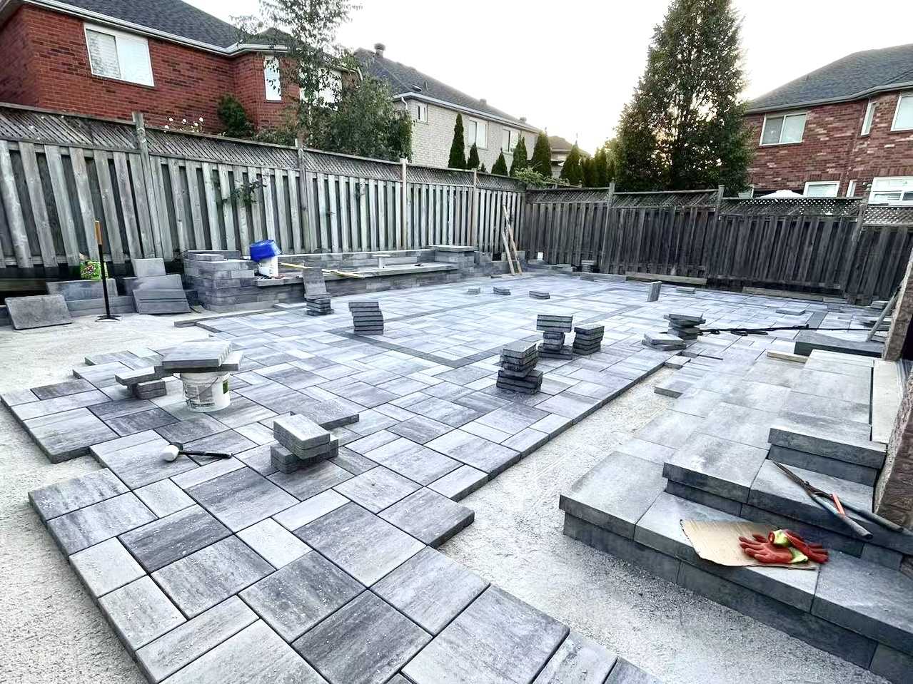 Bradford outdoor renovation with new patio and poolside tiles